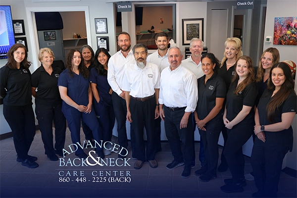 Chiropractors Matthew McNicholas, Daniel Mascaro, Michael Thomas, And Warren Geruso With Acupuncturist Huan Zhang And Team